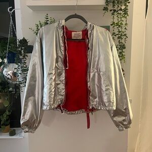 Metallic Silver Jacket with Bold Red Interior